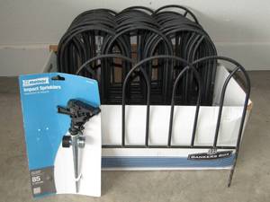 lot 23 image: Melnor impact sprinkler and garden bed fencing