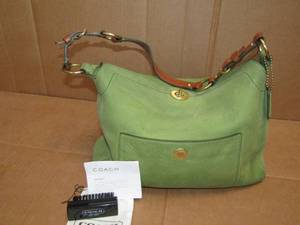 lot 31 image: Genuine Coach leather purse with accessories as shown
