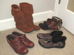 lot 56 image: Ladys Like new name brand shoes including Minnetonka, Toms, Merrell