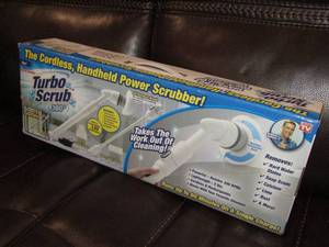 lot 63 image: Turbo Scrub 360, hand held cordless scrubber