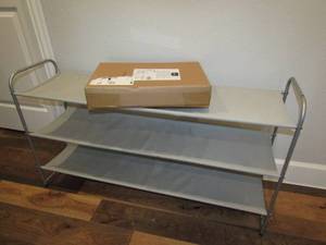 lot 66 image: Amazon basics underbed storage bags with zippers and metal shelf unit