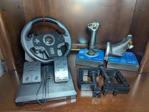 lot 132 image: PXN Racing Steering Wheel and Saitek X-45 Flight Simulator Controllers