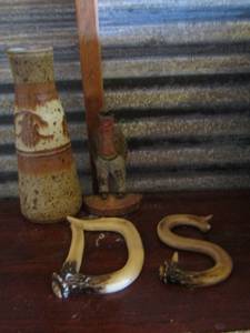 lot 101 image: hand painted vase- letter D&S made out of deer antlers