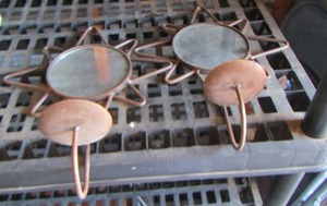 lot 136 image: star mirror wall art with candle holders