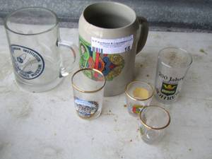 lot 18 image: various shot glasses and beer mugs