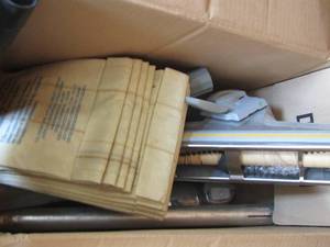 lot 352 image: VACUUM CLEANER PARTS - BAGS, HOSES PLUS