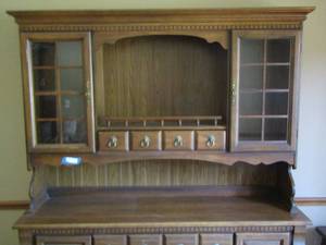 lot 71 image: Dark brown wood Hutch 2 pieces has lion head door knobs  top- 476514   bottom 336719  very nice