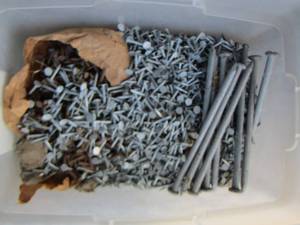 lot 87 image: box of small nails and a few large nails