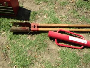 lot 75 image: post hole driver , post hole digger
