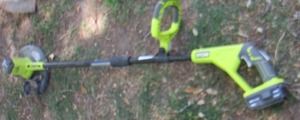 lot 18 image: Ryobi battery operated weed eater with charger and battery