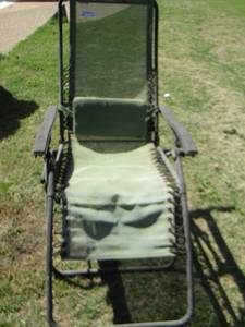 lot 56 image: Green lounge chair to enjoy the outdoors