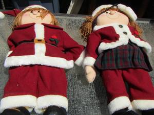 lot 134 image: Mr and Mrs. SANTA DOLLS