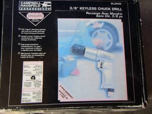 lot 149 image: CAMPBELL HAUSFELD 38 keyless Drill  IN BOX