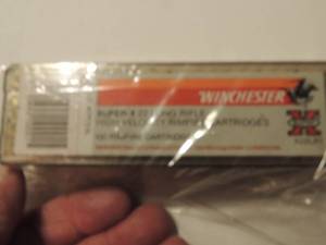 lot 207 image: WINCHESTER  22 LR  QTY 86 IN CONTAINOR