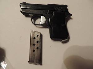 lot 5 image: FIE TITAN  25 CAL RUGAR IN LEATHER HOLSTER
