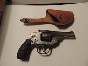 lot 206 image: IVER JOHNSON ARMS & CYCLE  32 CAL REVOLVER  IN LEATHER HOLSTER  ( SOME PITTING)