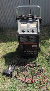 lot 30 image: century Battery charger and tester 220 amp, car tire pump and jumper cables was not tested