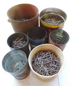 lot 60 image: Cans with nails see pictures