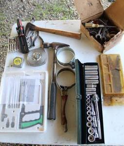 lot 7 image: Mixed lot of tools , socket set, oil wrench, hammers, tape measures and more