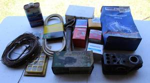 lot 57 image: Mixed lot of parts transmission parts oil filters fuel cap and much more see pictures
