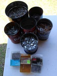 lot 59 image: Cans with nails screws Staples see pictures