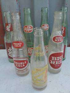lot 117 image: Vintage Dr pepper, Big Red, double cola, chocolate soldier, bottles