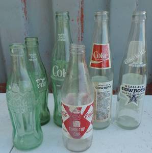 lot 118 image: Vintage Coke bottles