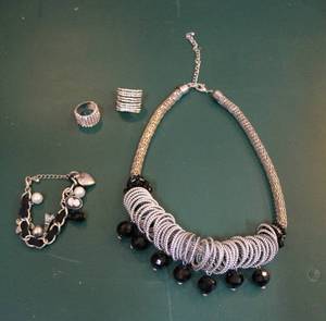 lot 214 image: Necklace and bracelet and rings