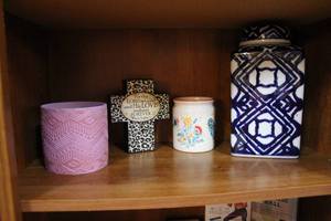 lot 228 image: jar with lid 2 smaller canisters and a cross
