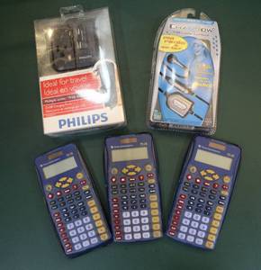 lot 230 image: 3-calculators adapter plug and earbuds