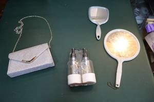 lot 245 image: sparkly purse two mirrors and pump bottles