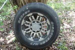 lot 130 image: One P2657or17 Discoverer Cooper Tire with Rim
