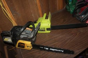 lot 137 image: Poulan Wood Shark Chain Saw and Homelite 16 Chain saw
