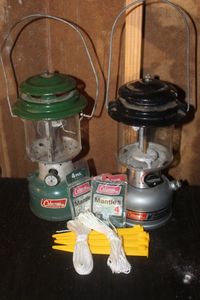 lot 324 image: Two Coleman Fuel Lanterns with extra Mantles and more