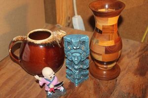 lot 353 image: Wooden Vase From Roatan Honduras, Hull Pottery Brown Drip Teapot, and More Home Decor Items