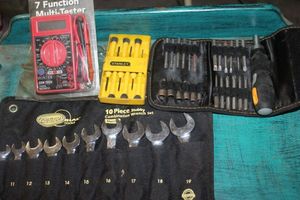 lot 431 image: Metric Combination Wrench Set, Unused Multi-Tester, Nut Driver set, and Stanley Mini screwdriver Set