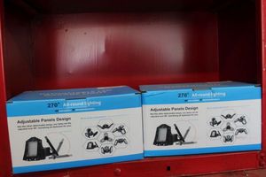 lot 443 image: Two Deformable LED Garage Lights, Appear Unused