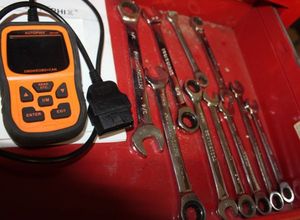 lot 445 image: OBD II Scanner, and Ratchet Wrenches
