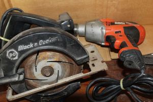 lot 220 image: Black and Decker Skill Saw and 12 Drill