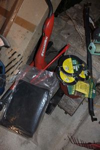 lot 388 image: GrassHog Electric Weedeater Soaker Hoses, Saw, Loppers and more