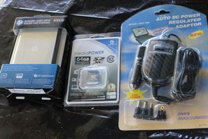 lot 479 image: 500G Portable Hard Drive,  64G Memory Card, And Auto DC Power Adaptor (All SIP)