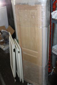 lot 30 image: Iron Away Murphy Style Ironing Board and Also Cabinet Doors