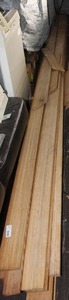 lot 31 image: Several Long Sticks Of Unfinished Trim