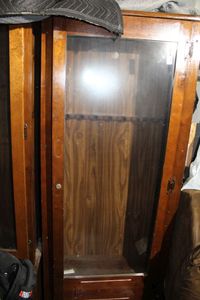 lot 32 image: Gun Cabinet with Storage Space on Bottom Approx 5ft tall