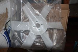 lot 34 image: Tractor Fan 1310 and Fuel Bowl and Filter for 1310