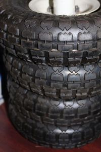 lot 47 image: Four 10 inch Tires and Rims