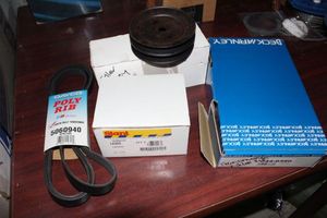 lot 65 image: Dayco Supertine Belt 5060940, Stant Thermostat 14569. VW Idler Pulley, BeckArnley 0440350 Transmission Filter Kit