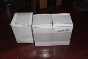 lot 67 image: Three John Deer Air Filters