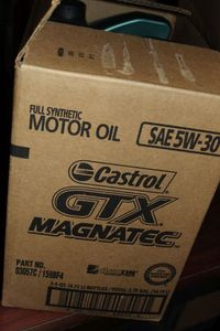 lot 78 image: Three 5Quart Castrol GTX Magnatec Motor Oil Full Synthetic 5W30
