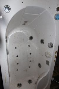 lot 168 image: Whirlpool Bathtub need Wiped Out